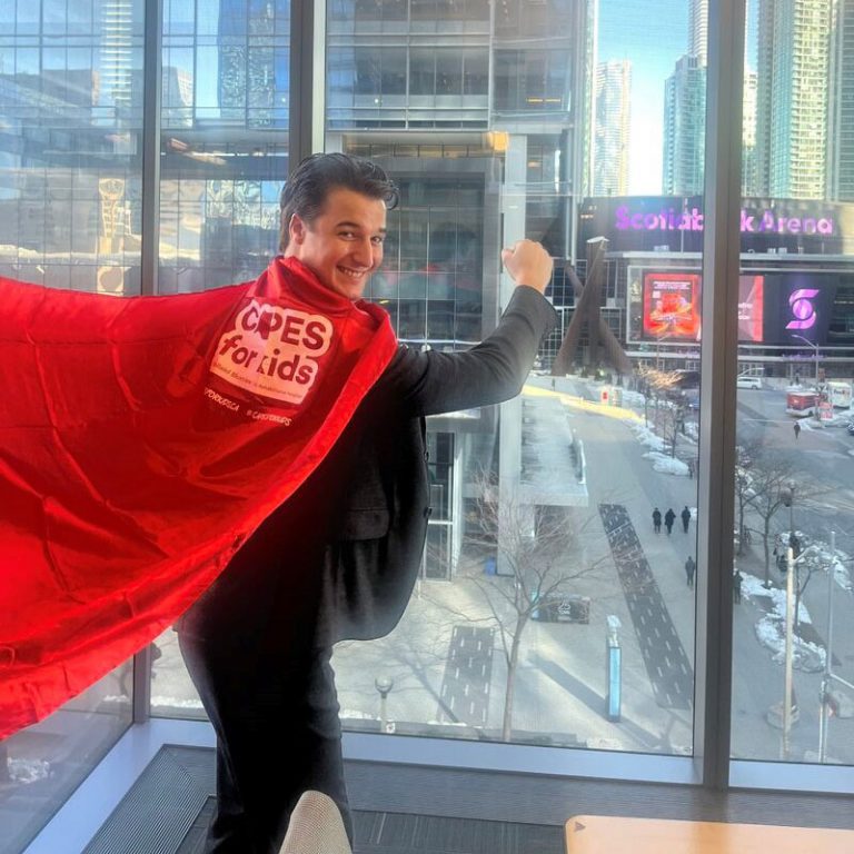 Graeme White with red cape